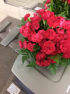 Fresh flowers at the sinks